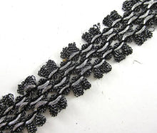 Load image into Gallery viewer, Trim with Black Rope Intertwined with Metallic Silver Thread 1&quot; Wide, Sold by the Yard