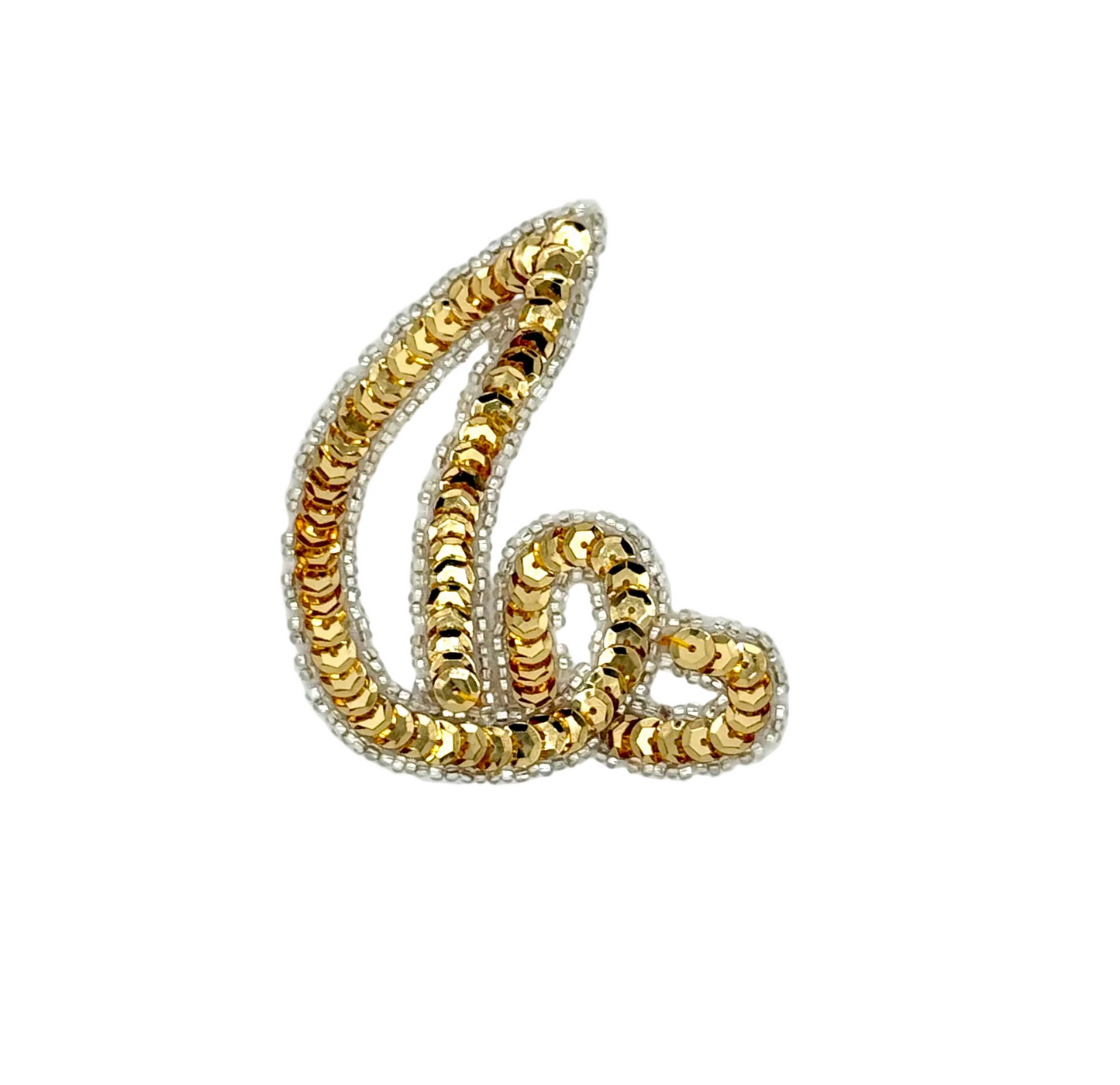 Gold and silver sequin appliqué on a white background