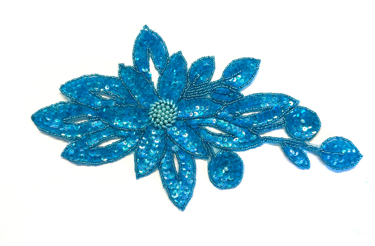 Flor con lentejuelas y cuentas turquesa 28 cm x 15 cm