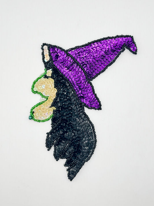 Witch with a Wart on Her Chin with Purple, Black, Iridescent Yellow and Iridescent White Sequins - Green, Black, White and Turquoise Beads 7" x 5" Pre-glued Back