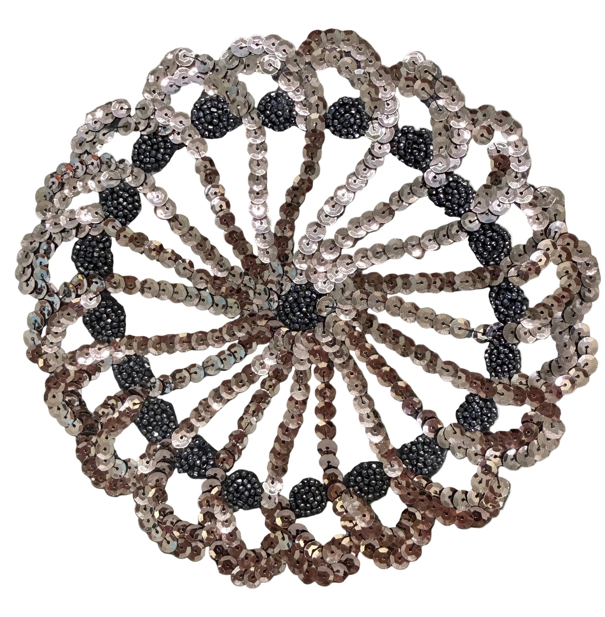 A circular sequined floral or rosette-style decorative piece made of layered silver, bronze, and black sequins, photographed from above on a white background.