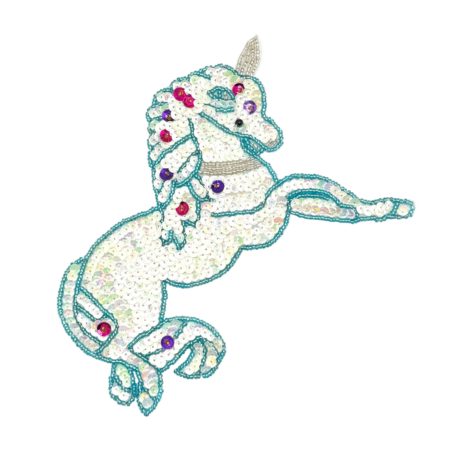 Decorative unicorn with sequins and beads on a white background