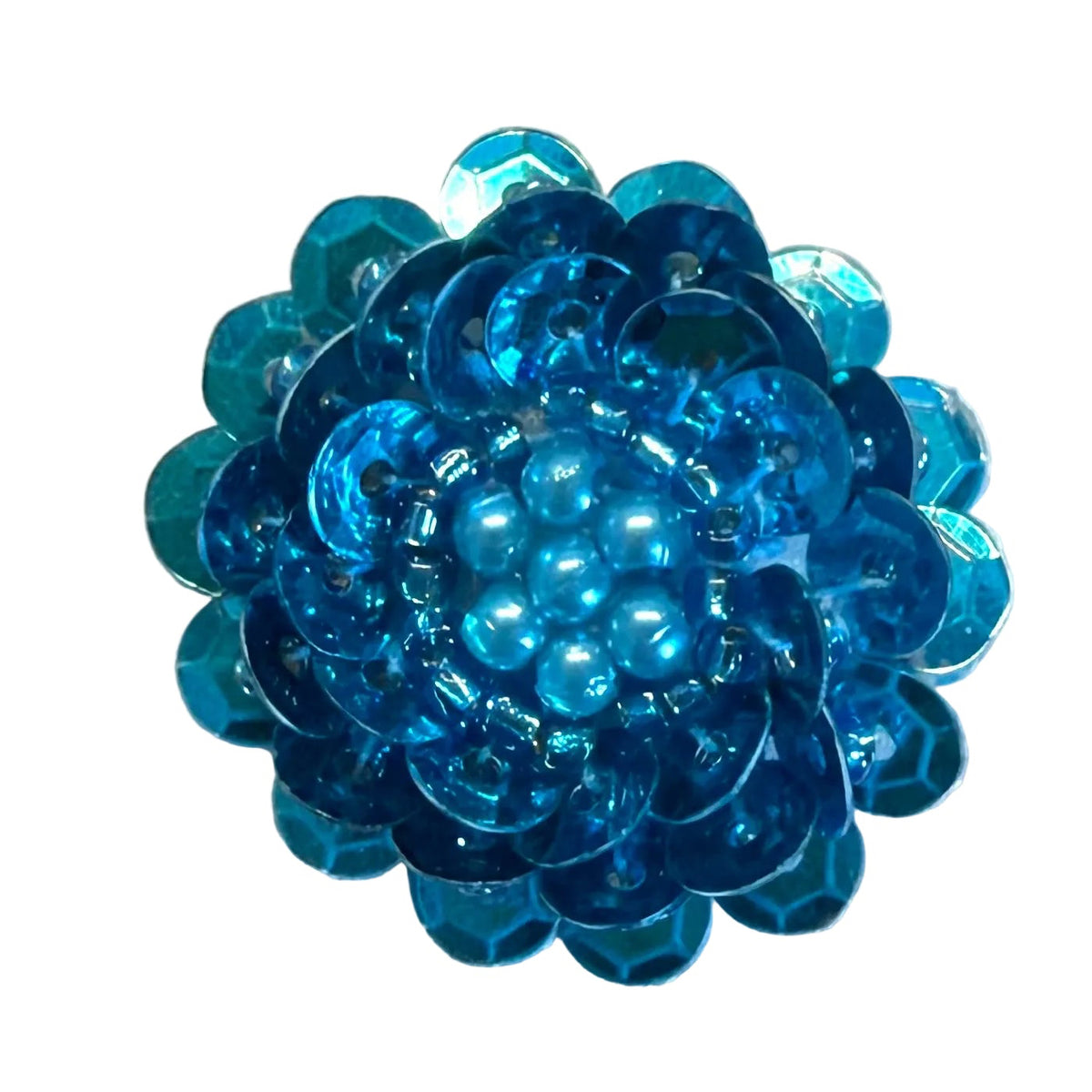 This petite Flower Appliqué combines blue sequins with bead and pearl accents for a charming touch of shimmer.