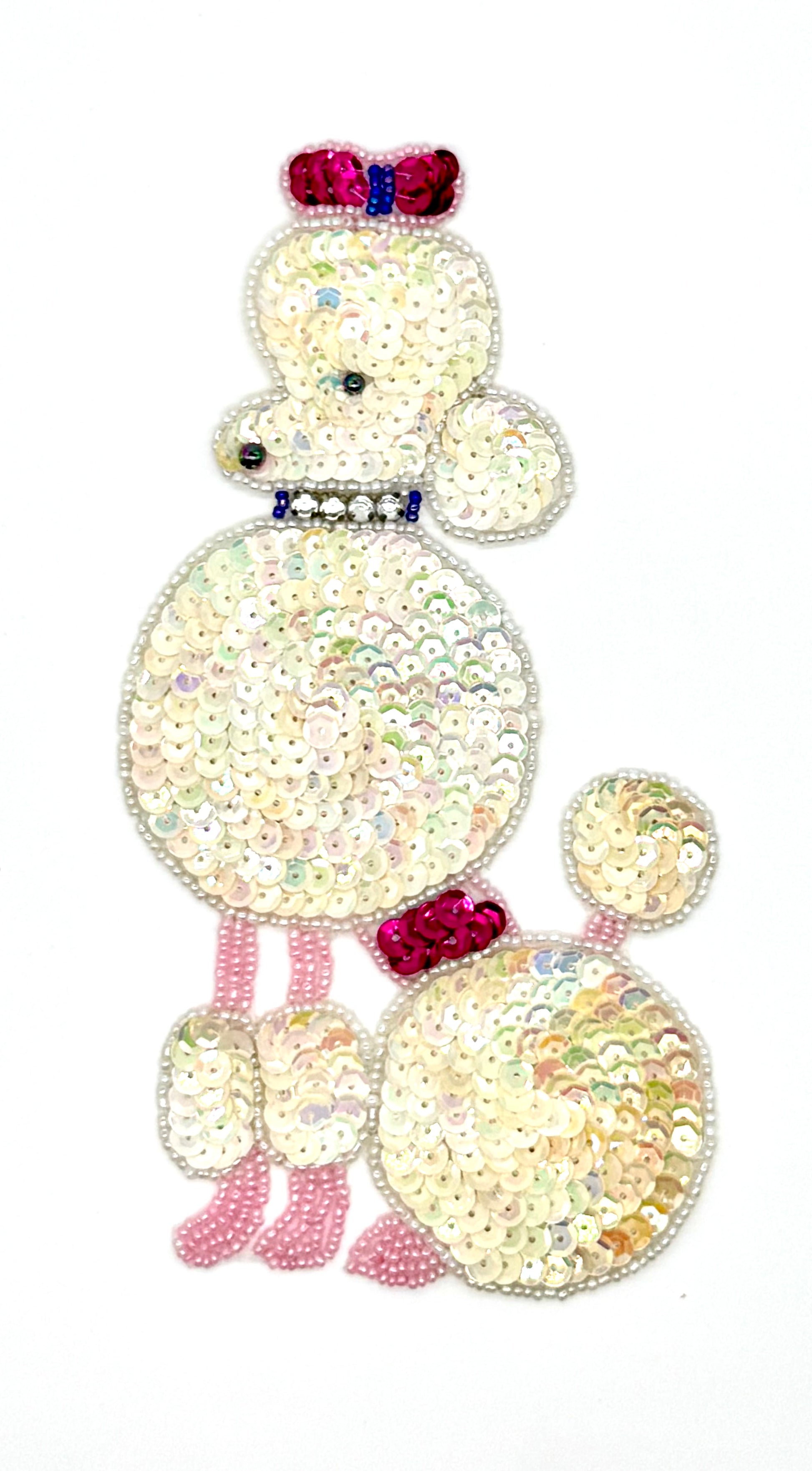 Sequined dog patch with colorful details on a white background