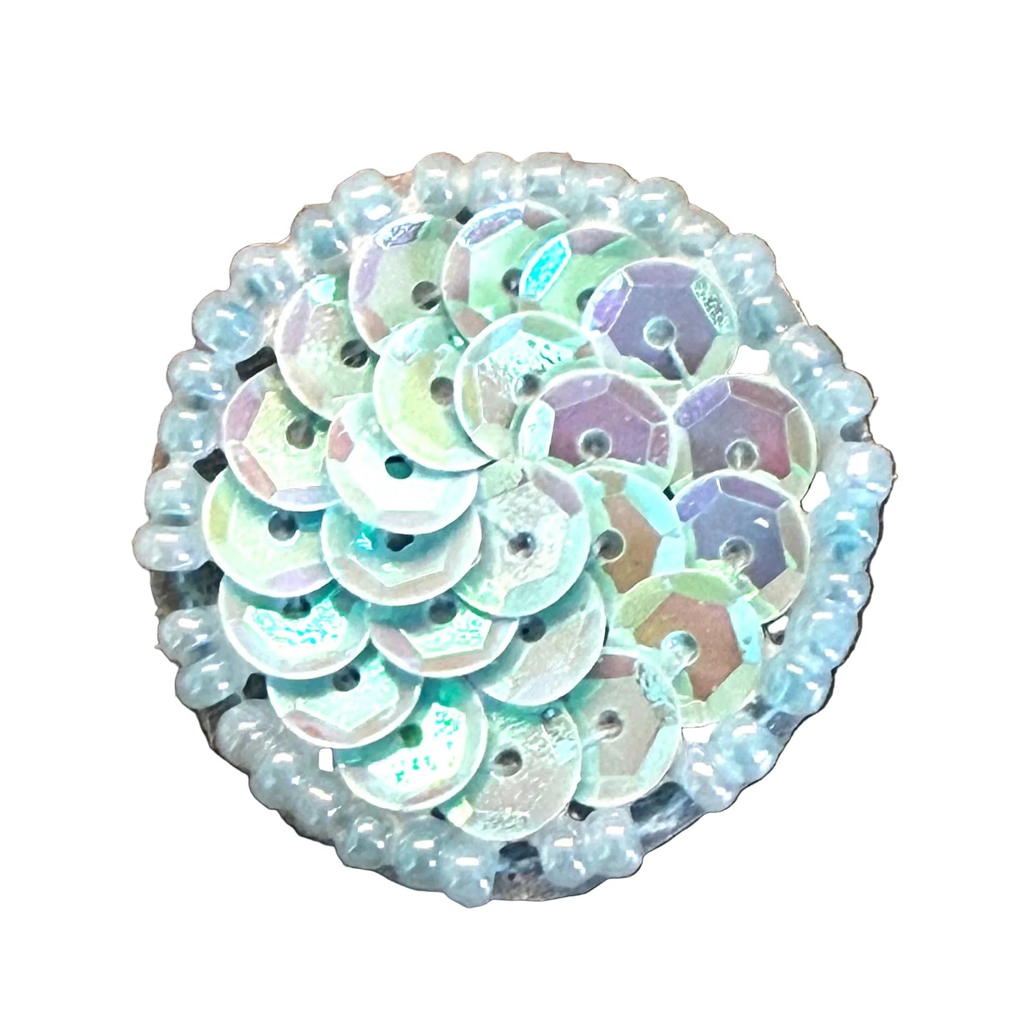 Round sequin embellishment with iridescent finish on a white background