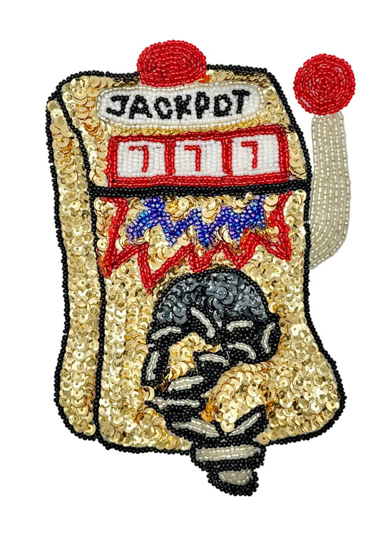 Decorative patch resembling a slot machine with 'JACKPOT' text, and red elements on a white background.