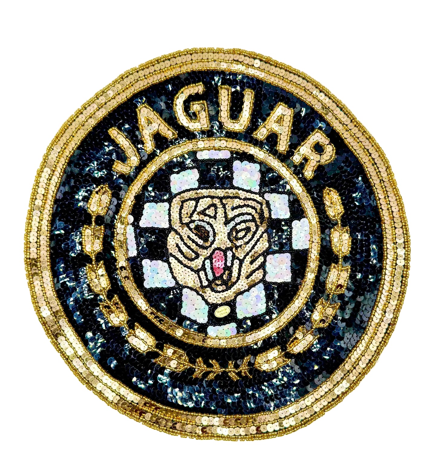 A circular sequin and bead vintage patch featuring the word 'JAGUAR' in gold around a stylized jaguar head on a black and white checkered background, with gold sequined detailing.