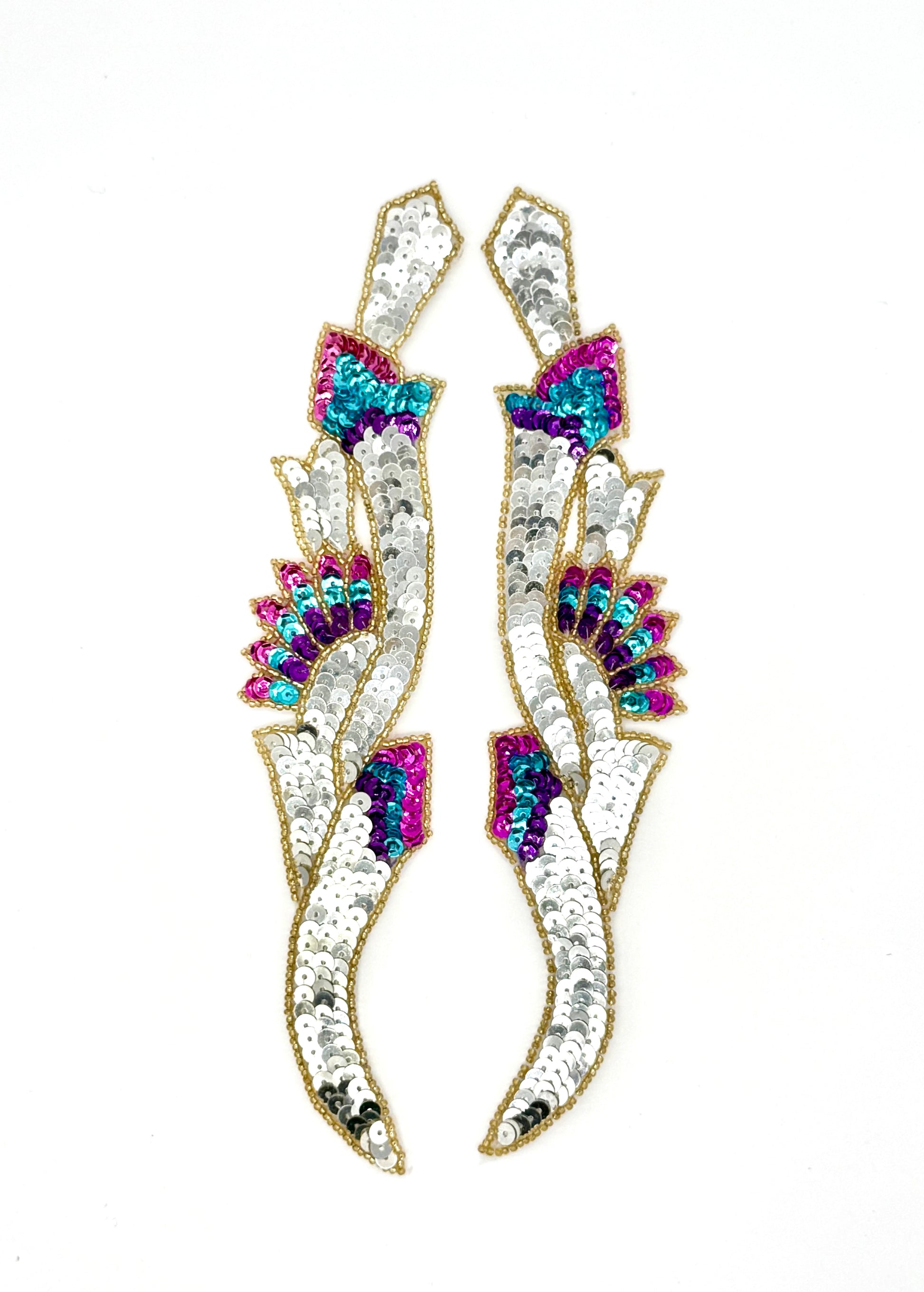 Sequin accent pairs with colorful sequins and gold beads on a white background