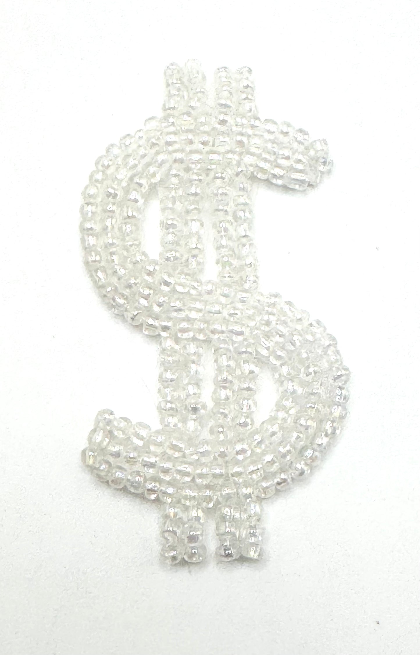 Signo de dólar con cuentas transparentes iridiscentes 7 x 3.8 cm