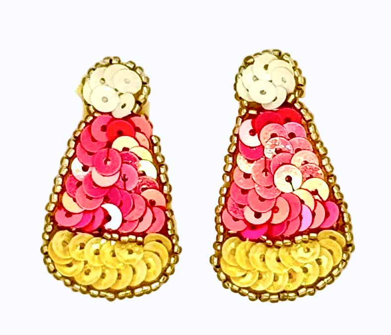 Pair of sequin corn candy with pink, white and yellow sequins and gold glass beads design on a white back