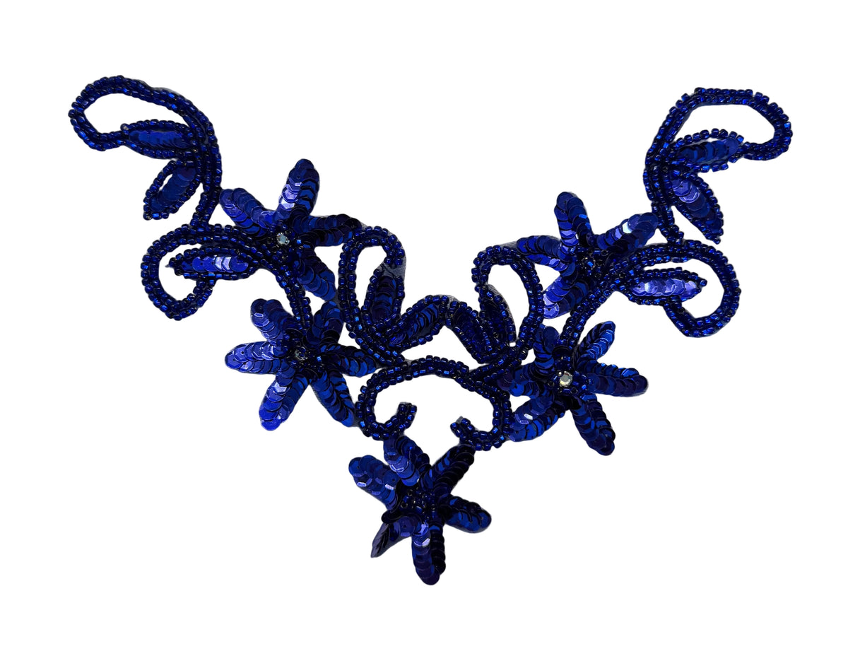 A royal blue sequined embroidery neckline applique featuring floral and scroll motifs, displayed on a plain off-white background.