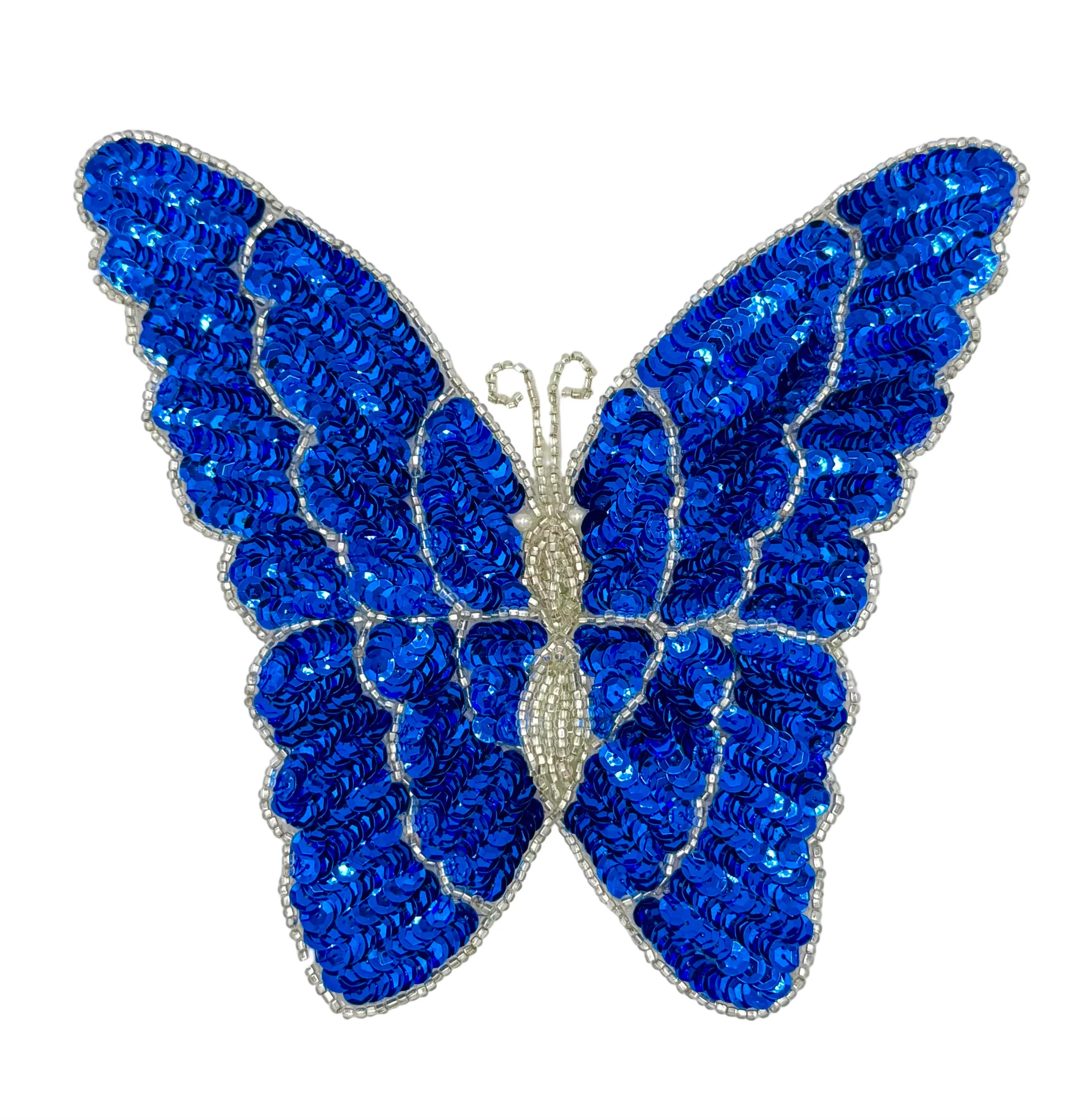 Blue butterfly-shaped patch with sequins on a white background