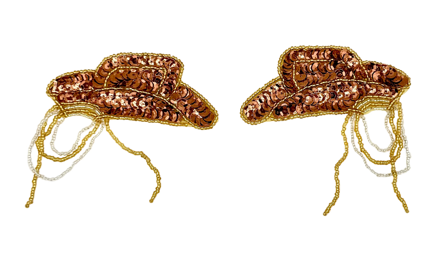 Pair of Bronze sequin and bead cowboy hats with rope on a white background