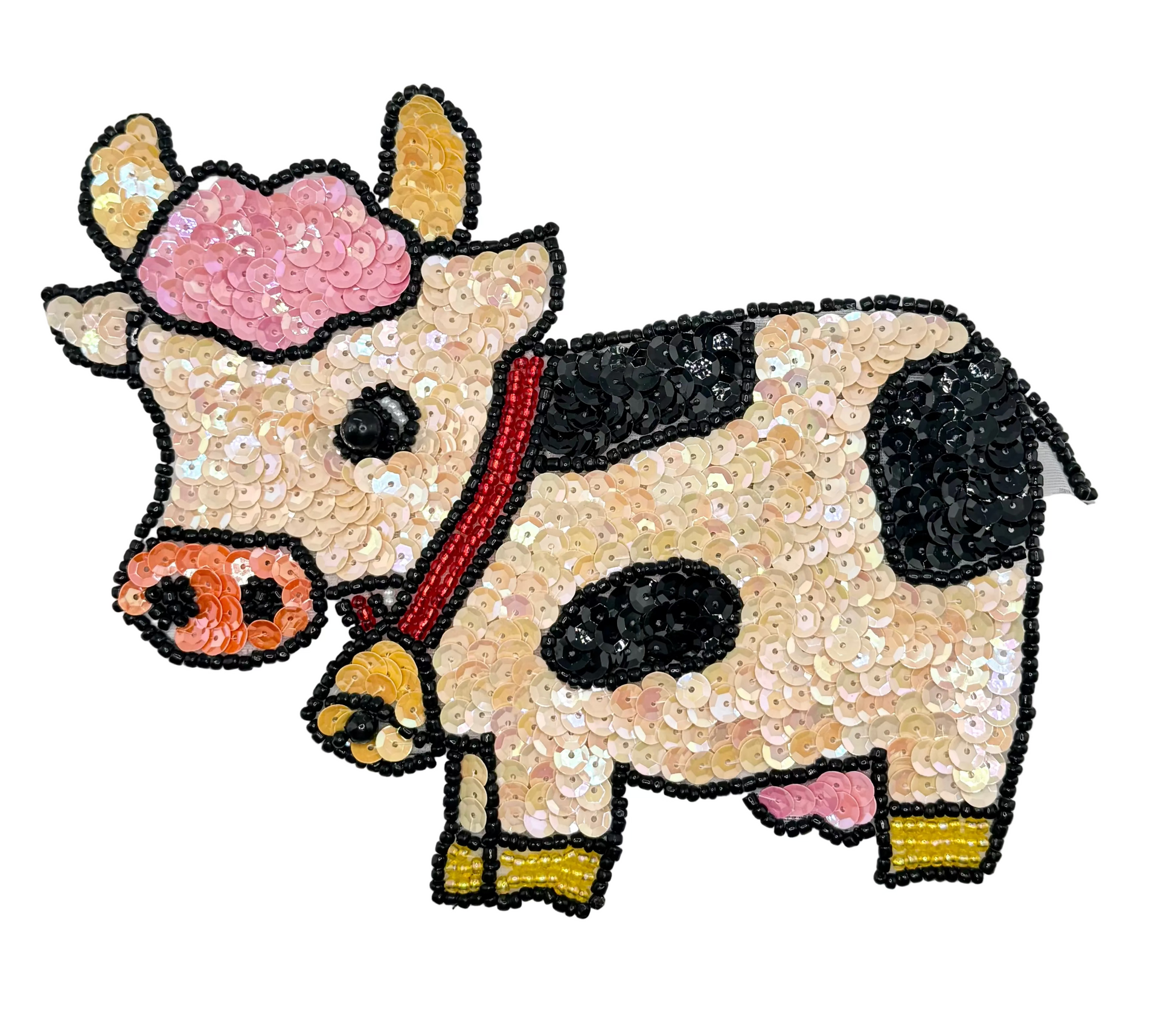Sequined cow patch with pink hair bow on a white background
