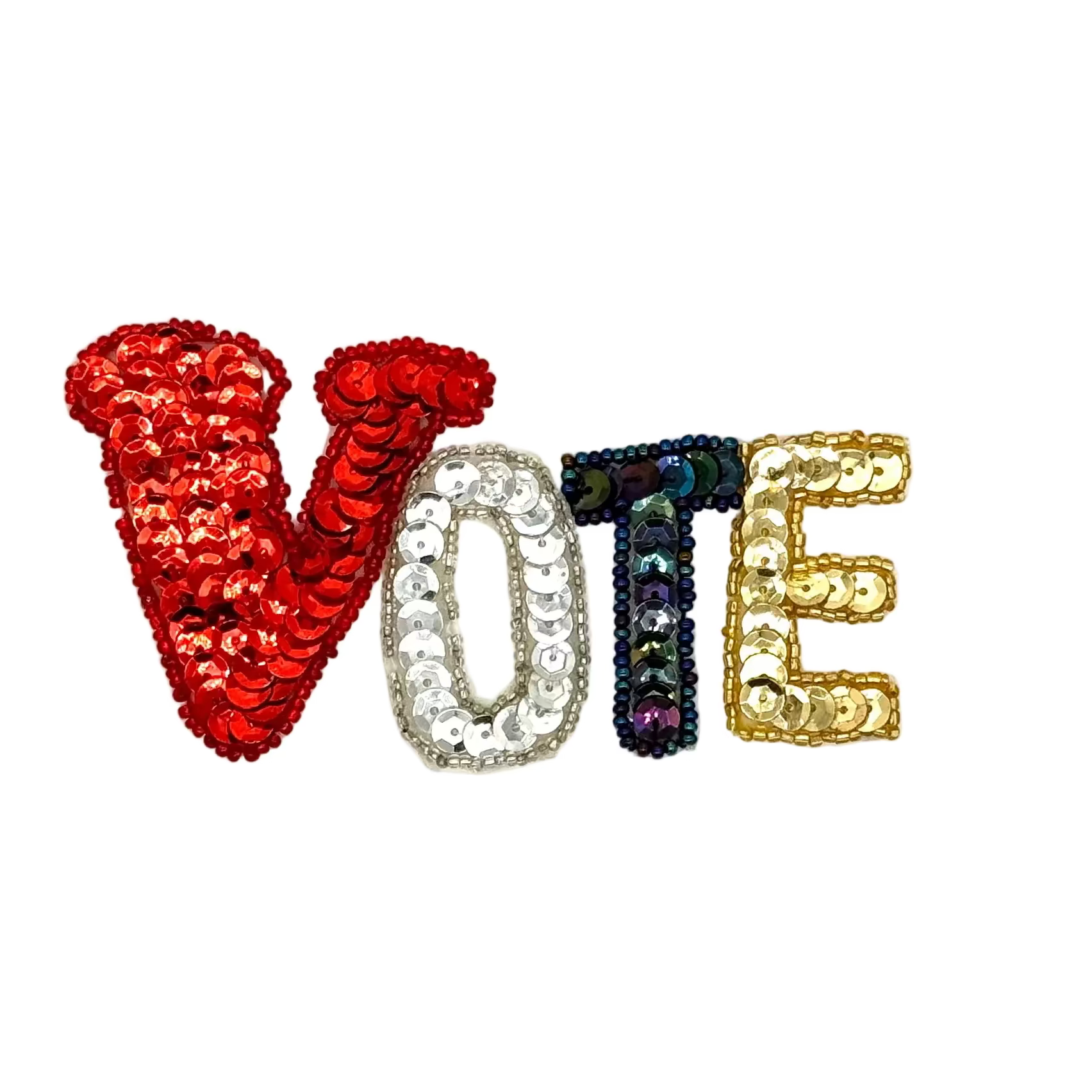 Sequined letters spelling 'VOTE' on a white background