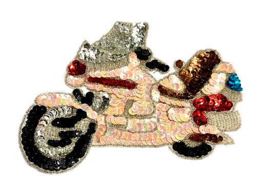 Decorative sequin patch with motorcycle design featuring sequins and beads on a white background