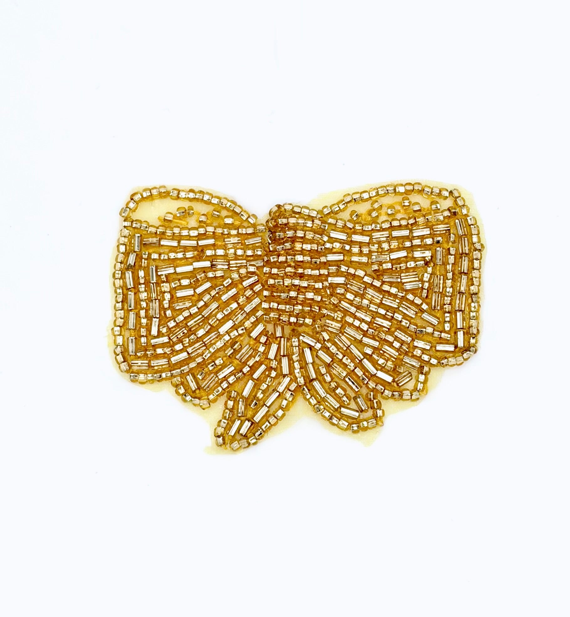 Beaded Gold butterfly-shaped patch on a white background