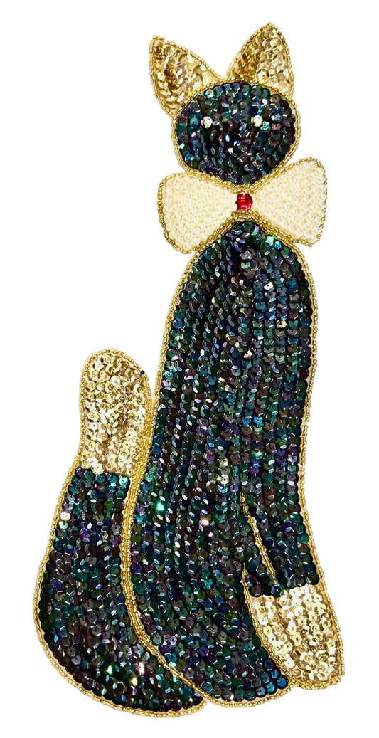 Large sequin and bead cat on a white background