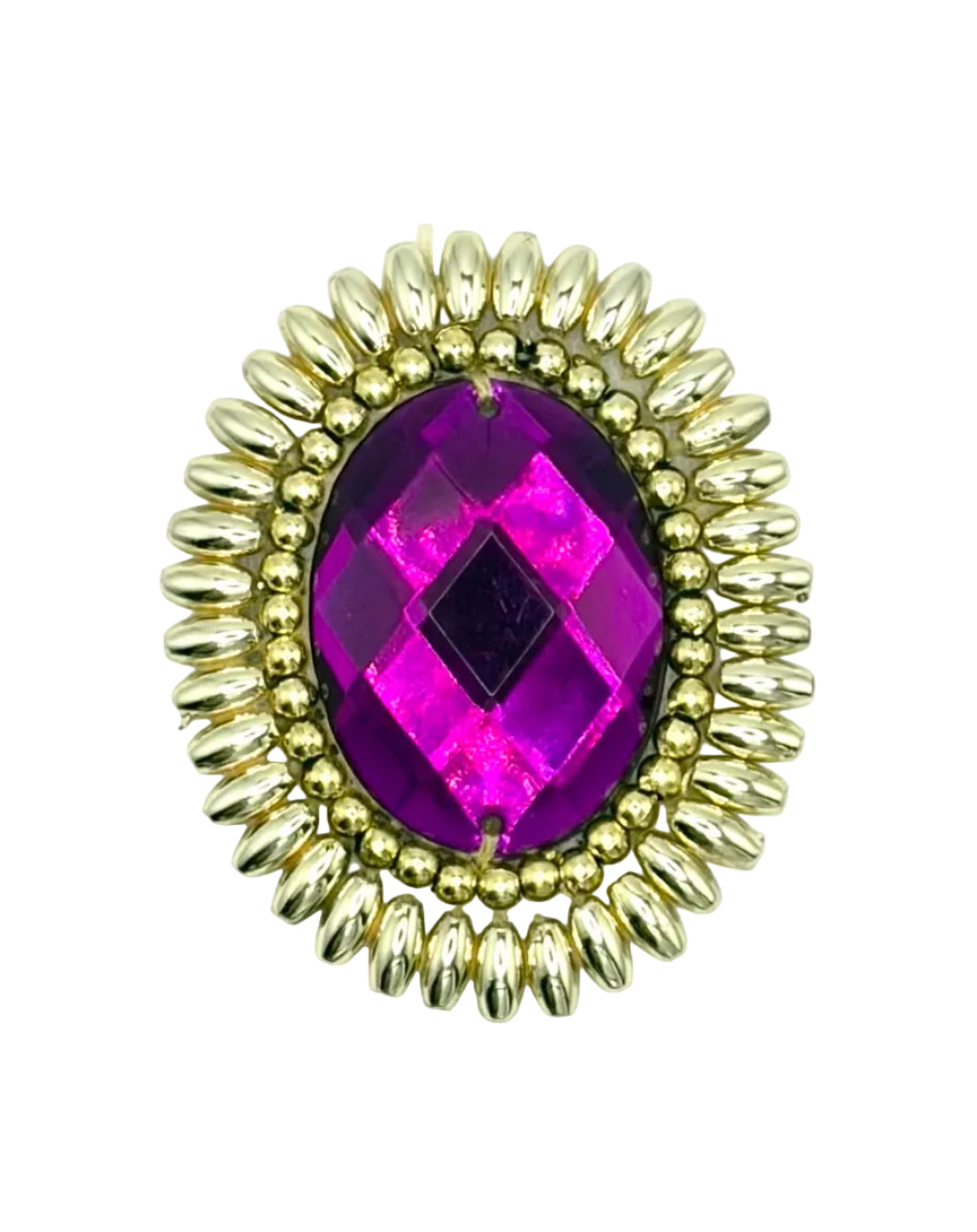 An oval patch featuring a faceted purple crystal gemstone in the center, surrounded by a textured gold-tone metal border with a sunburst pattern, set against a plain white background.