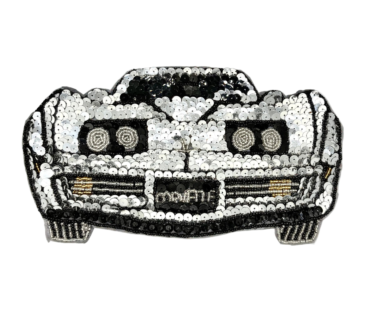 A car-shaped sequin patch featuring a black and silver design with circular details resembling headlights and grille, shown on a plain white background.