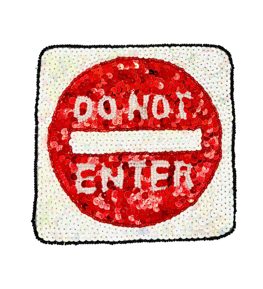 A square patch featuring a red sequined 'DO NOT ENTER' circle with a white center bar, bordered by a white sequined square with a black stitched edge, shown on a plain white background.