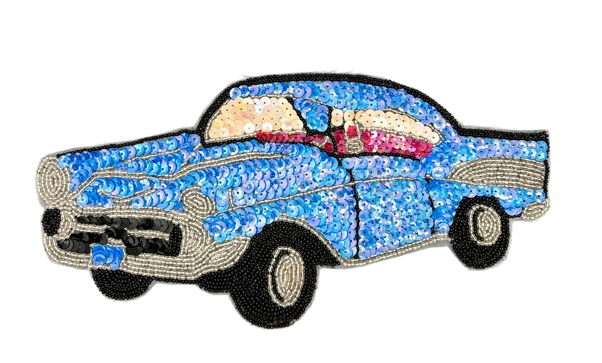 A decorative sequin and bead patch depicting a vintage blue car with black wheels, silver trim, and a pink and cream interior, shown on a plain white background.