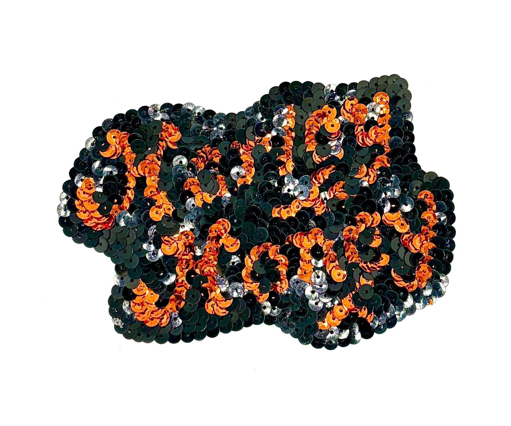 A cluster of black and orange sequins arranged to spell the phrase 'Harley Honey' on a plain white background.