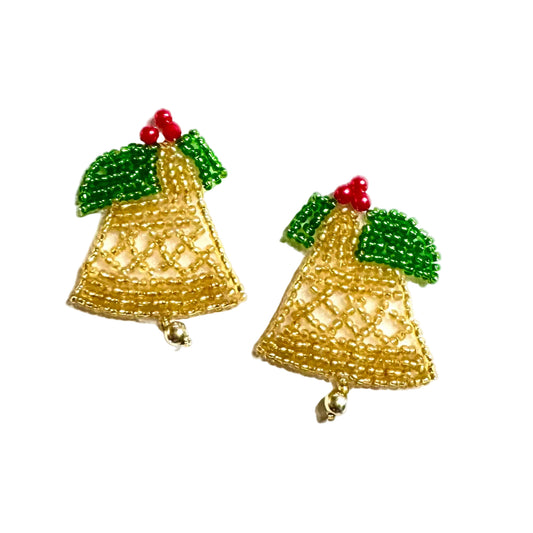 A pair of gold beaded bell-shaped appliqués decorated with green beaded holly leaves and Fuchsia beaded berries, shown on a plain white background.