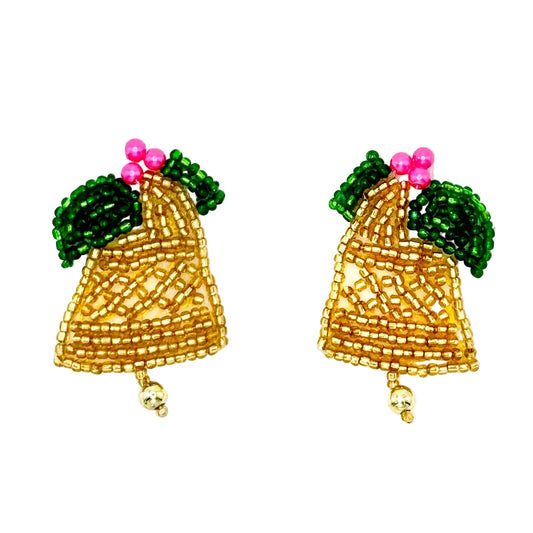 A pair of handmade beaded bell-shaped appliqués with green leafy tops, pink berry accents, and small dangling gold beads, shown on a plain white background.