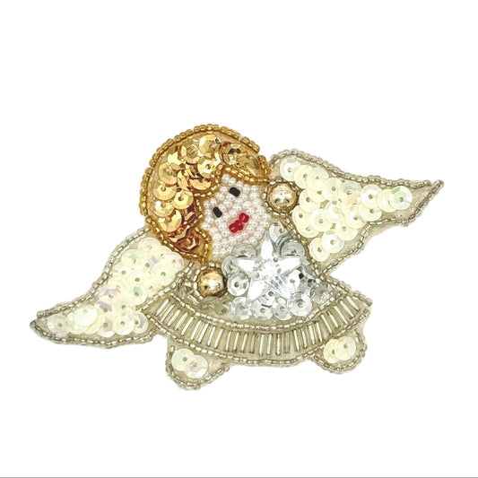 A decorative angel-shaped sequin patch featuring gold sequins, white beads, clear rhinestones, and small red and black facial details, shown on a plain white background.