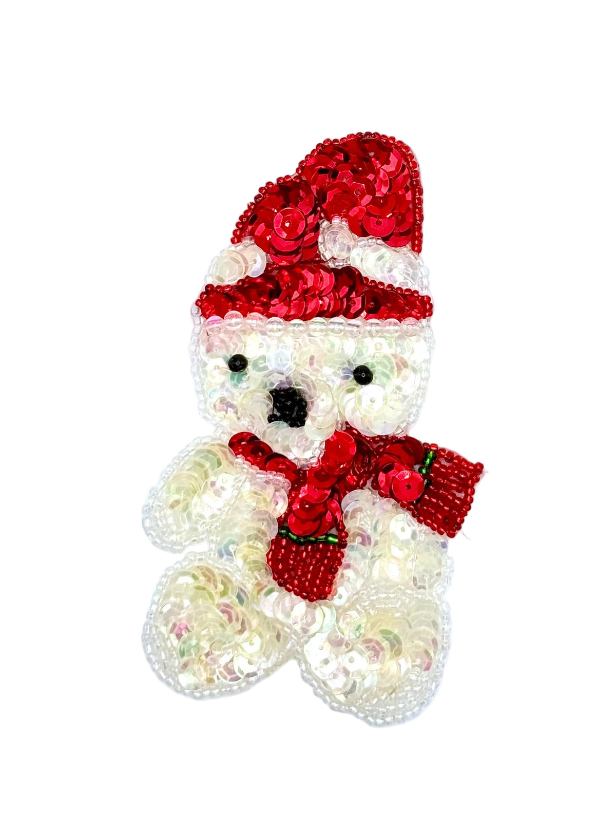 A teddy bear-shaped sequin embellishment featuring a iridescent body with red Santa hat and red bow tie, set against a plain white background.