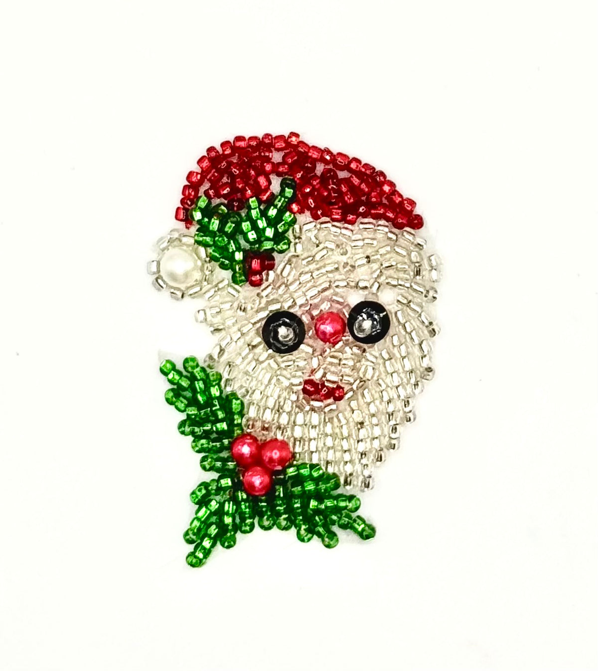Cara de Papá Noel con gorro en cuentas de 2” x 1.25”