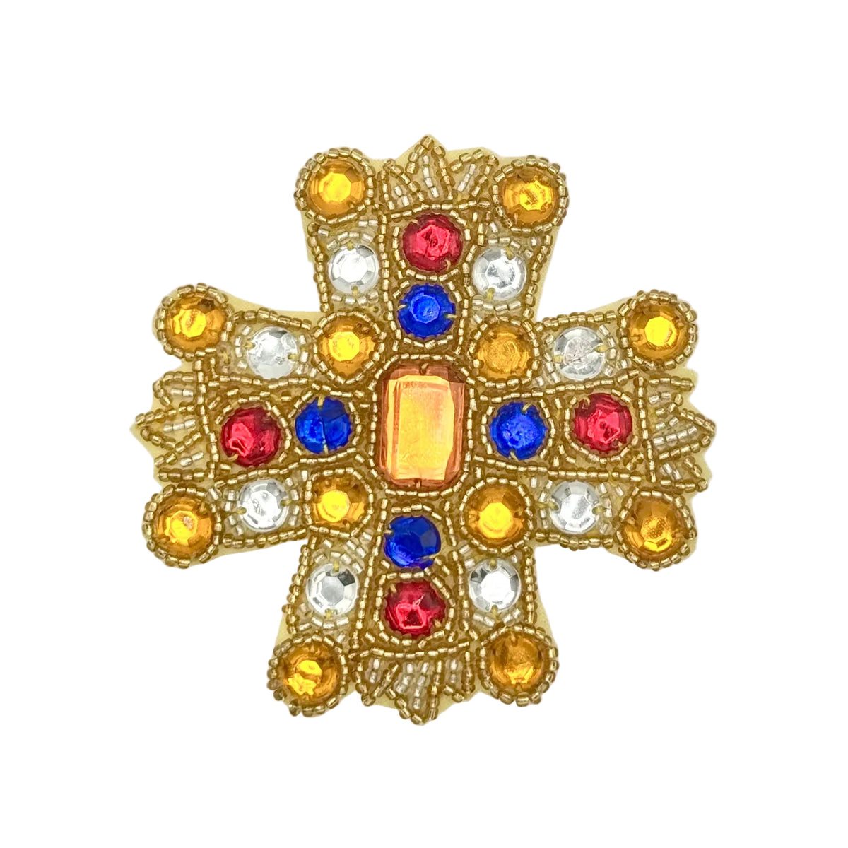 A gold-toned beaded cross embellishment decorated with red, blue, yellow, and clear rhinestones, shown on a plain white background.