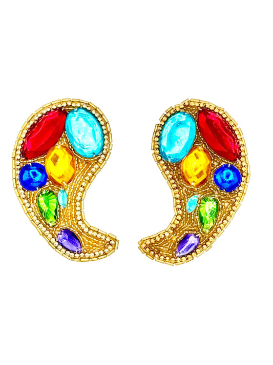 A pair of gold paisley-shaped patches embellished with colorful faux gemstones in red, light blue, yellow, dark blue, green, purple, and clear round stones, shown on a plain white background.
