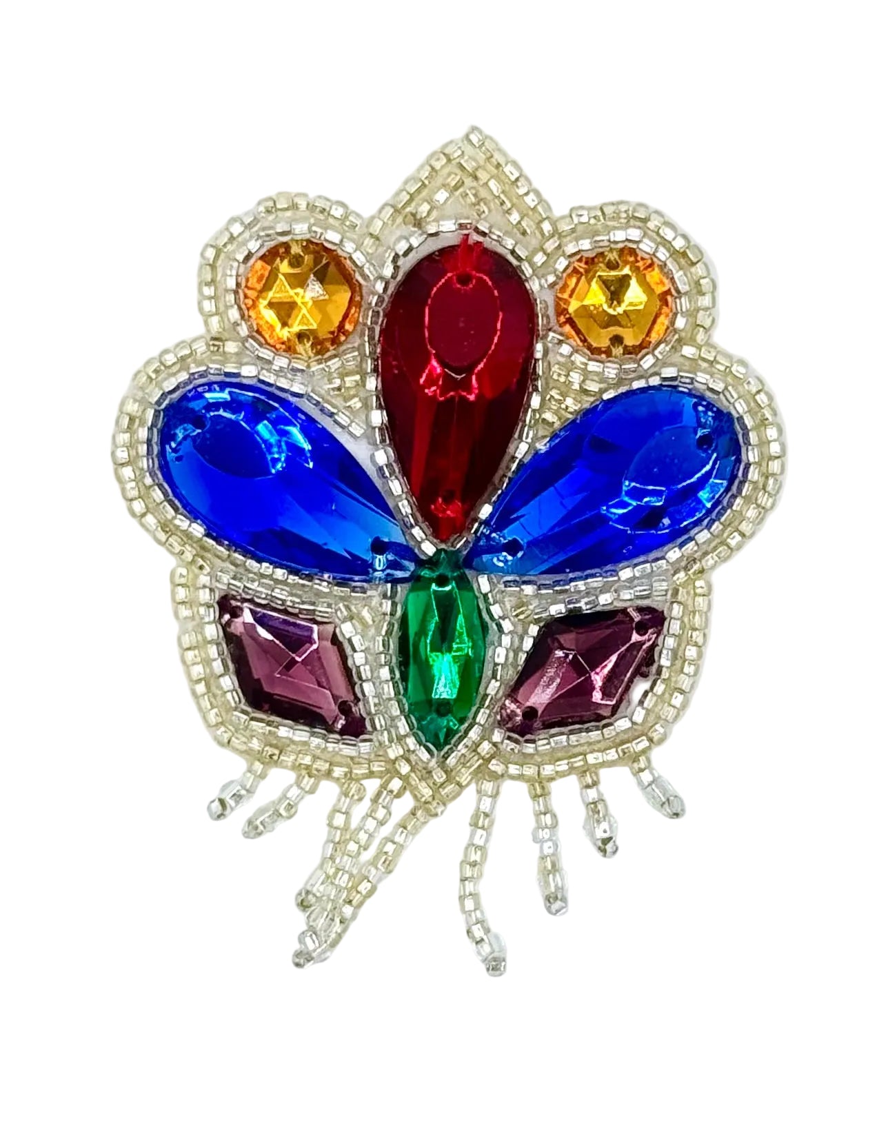 A colorful butterfly-shaped rhinestone patch with a silver beaded outline. The center features a large red teardrop crystal, flanked by blue teardrop crystals, with smaller green, purple, and gold crystals, and a silver beaded border.