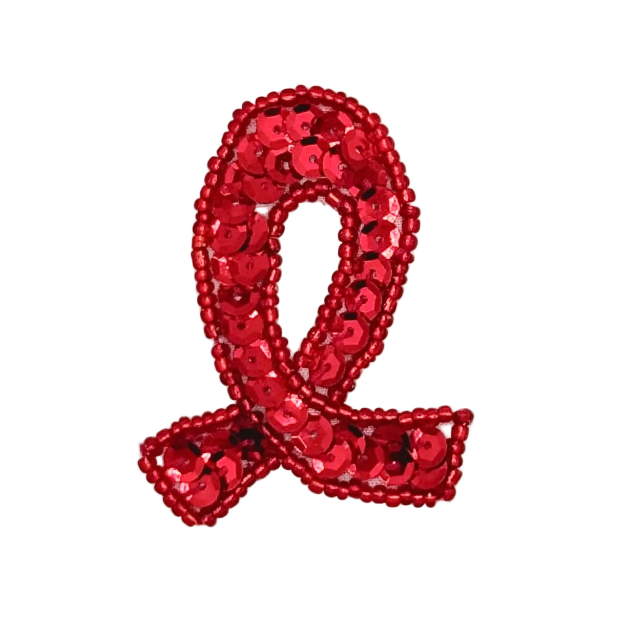 A red sequin awareness ribbon patch on a plain white background.