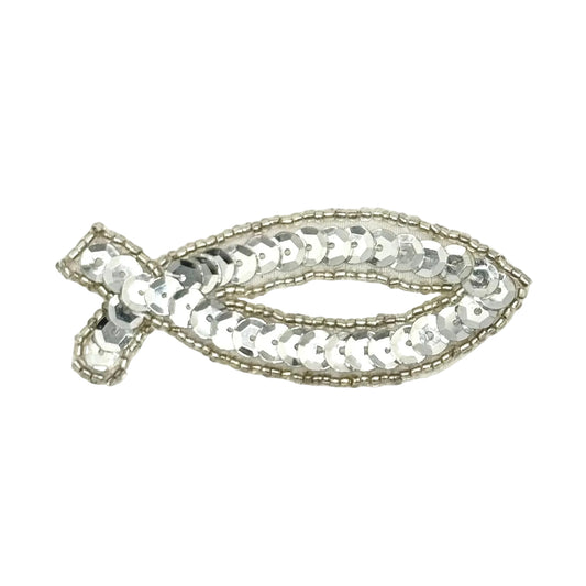A silver fish-shaped embellishment or brooch made of sequins and small beads, shown on a plain white background.