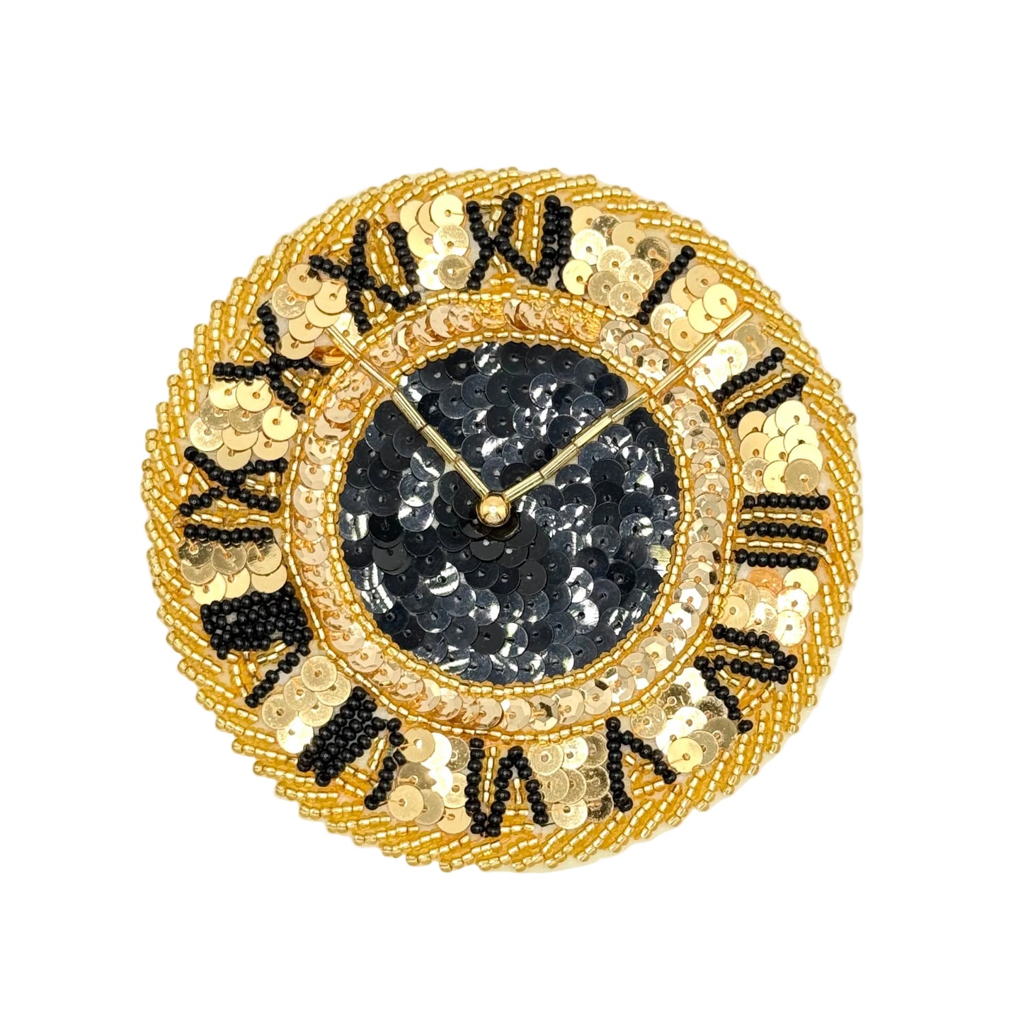 A round sequined wall clock with a gold-toned beaded frame, black and gold Roman numerals, and a black sequined center, shown on a plain white background.