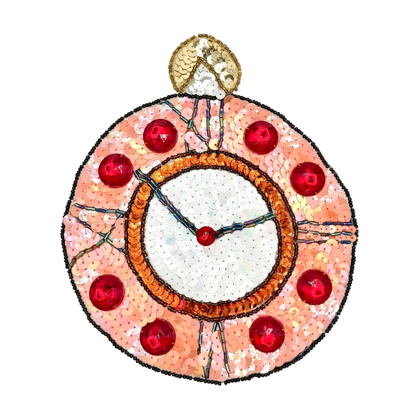 A round, handcrafted sequin clock applique or decorative wall clock featuring a peach-pink sequined outer ring, red faceted gem accents, a white center, and a gold-toned top loop, shown on a plain white background.