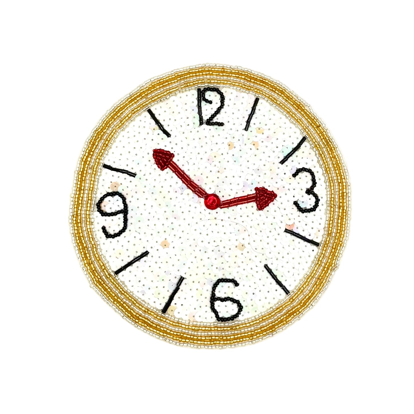 A circular clock face applique with a beaded silver and gold border, black Arabic numerals, and red hands on a white background.