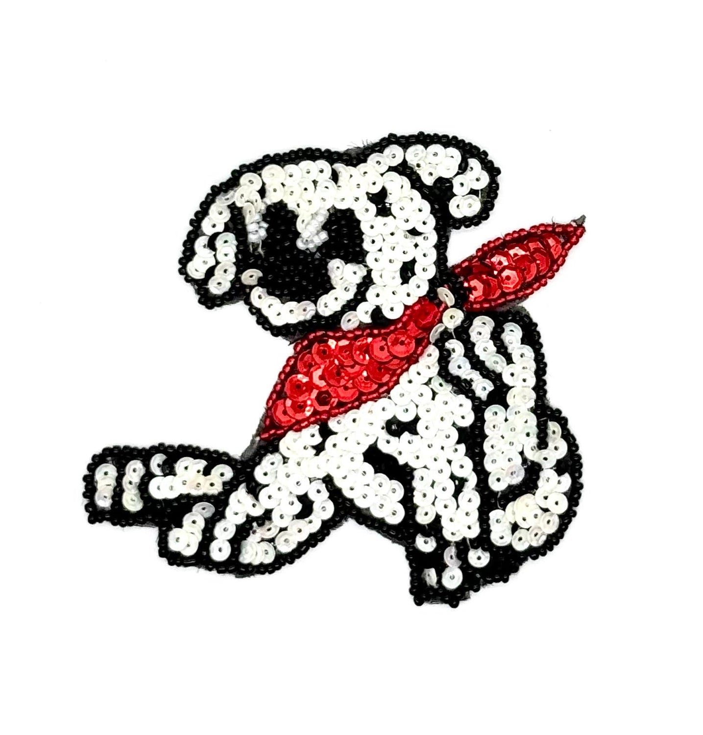Sequined dog with a red bandana on a white background