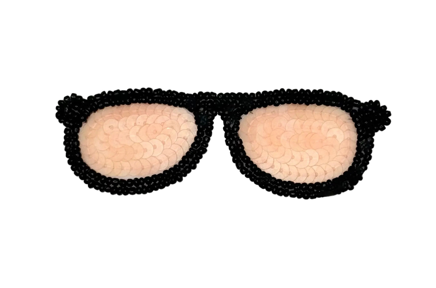 A novelty pair of eyeglasses crafted from black seed beads for the frames, with the lenses being peach-pink sequins, shown on a plain white background.