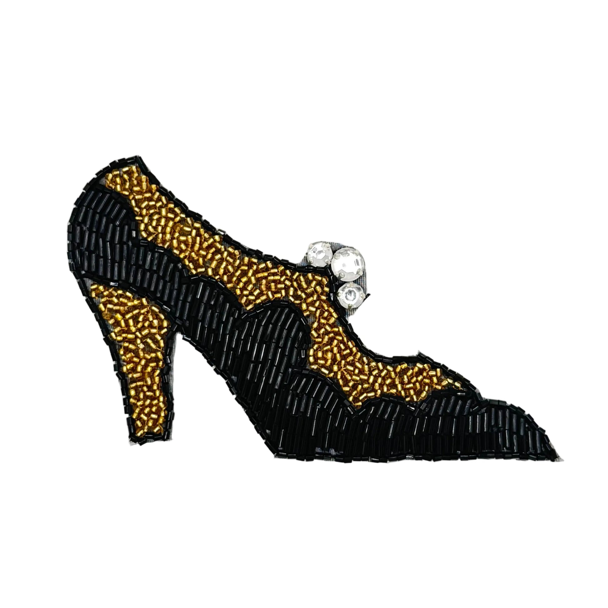 An beaded high-heeled shoe patch in black and gold with a small cluster of clear rhinestones on the strap, shown on a plain white background.