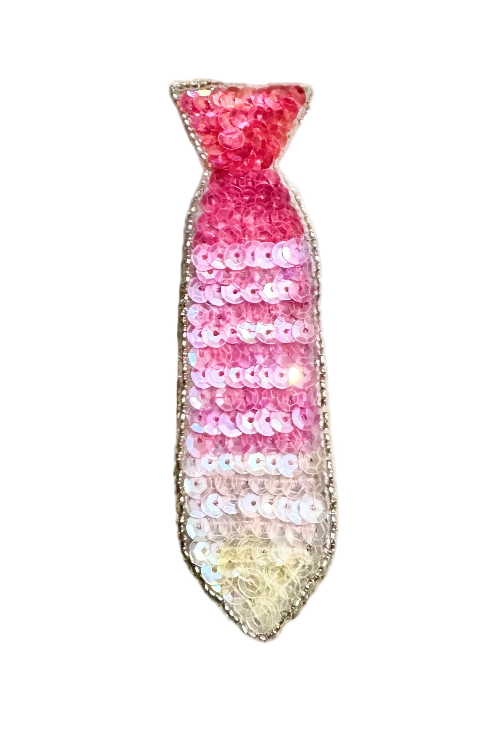 A sequined necktie-shaped applique with a pink gradient transitioning from red to fuchsia to pale pink, white, and cream at the tip, outlined with a glittery silver border on a plain white background.