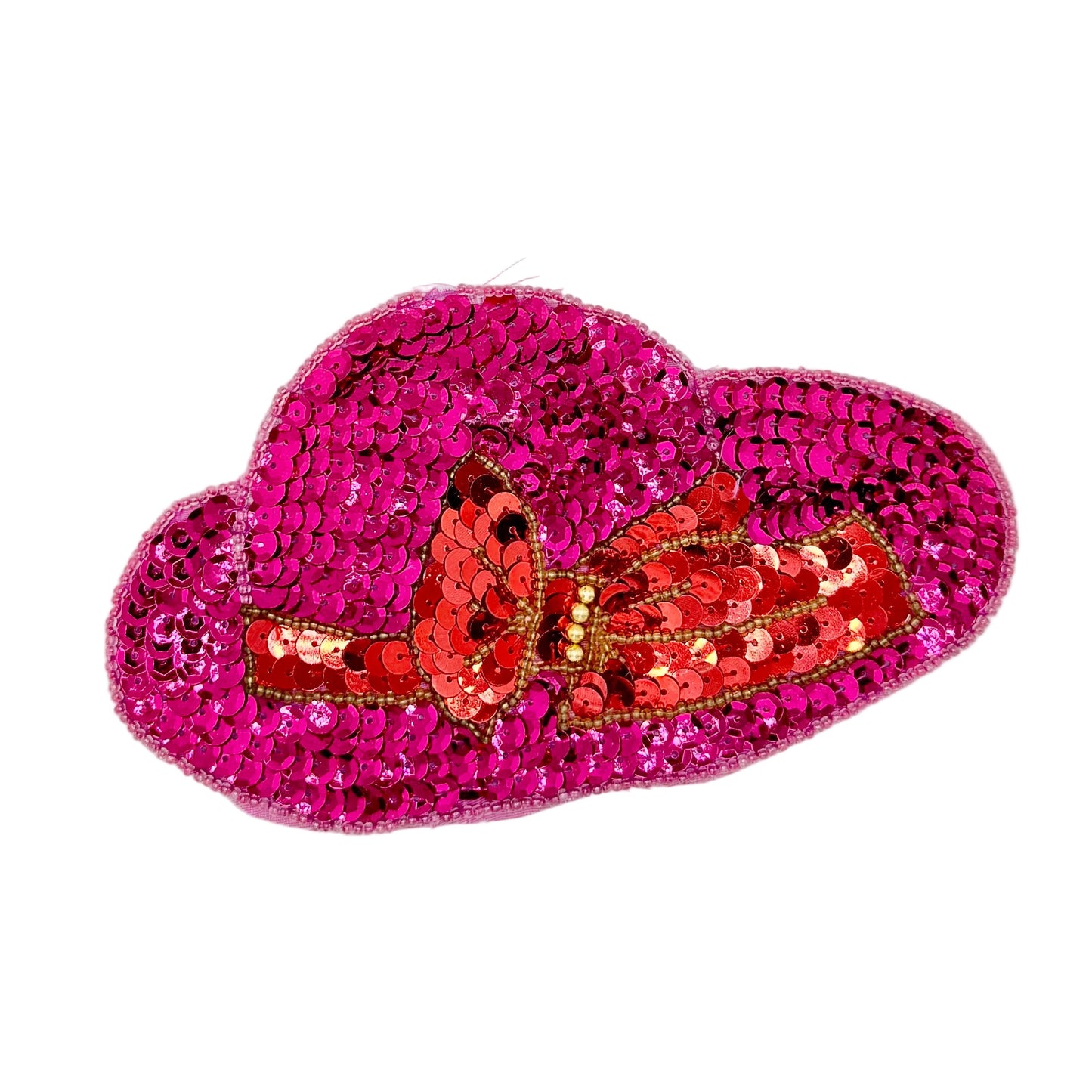 A fuchsia sequined hat patch with a red sequined bow and gold trim, shown on a plain white background.