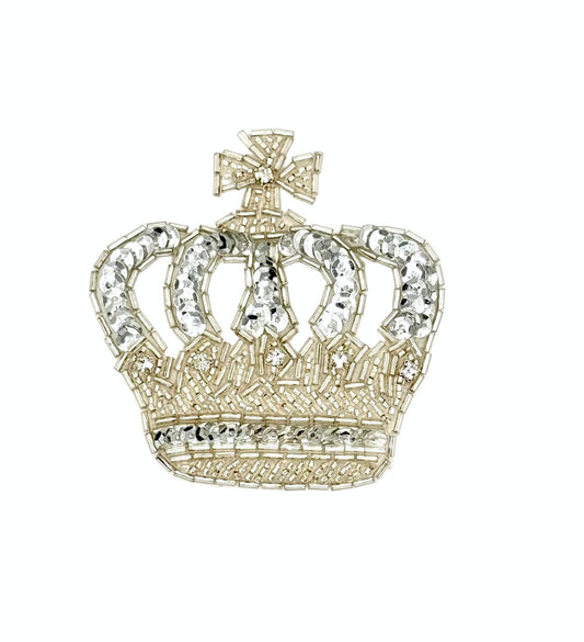 Silver crown with crystal rhinestones, sequins and glass beads on a white background
