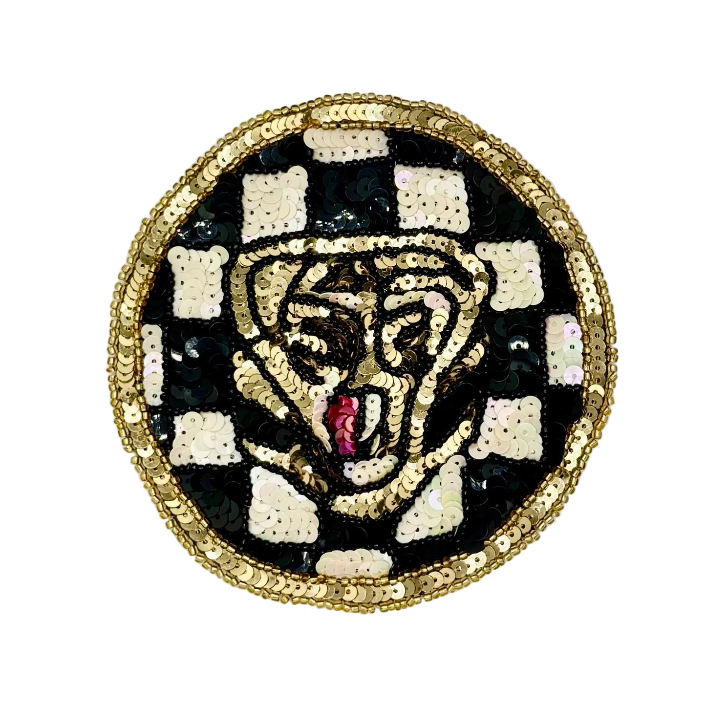A circular sequined patch featuring a stylized tiger face with a pink tongue, set against a black and white checkered background and finished with a gold braided border.