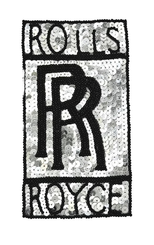 A rectangular patch featuring a Vintage Rolls-Royce logo, crafted with black beads and silver sequins on a white background.