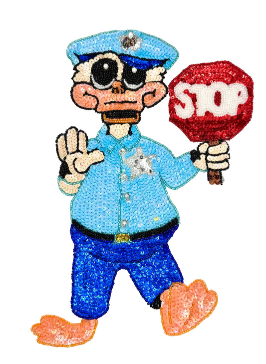 A cartoon-style sequin and beaded character patch showing a duck police officer with a stop sign on a plain white background.