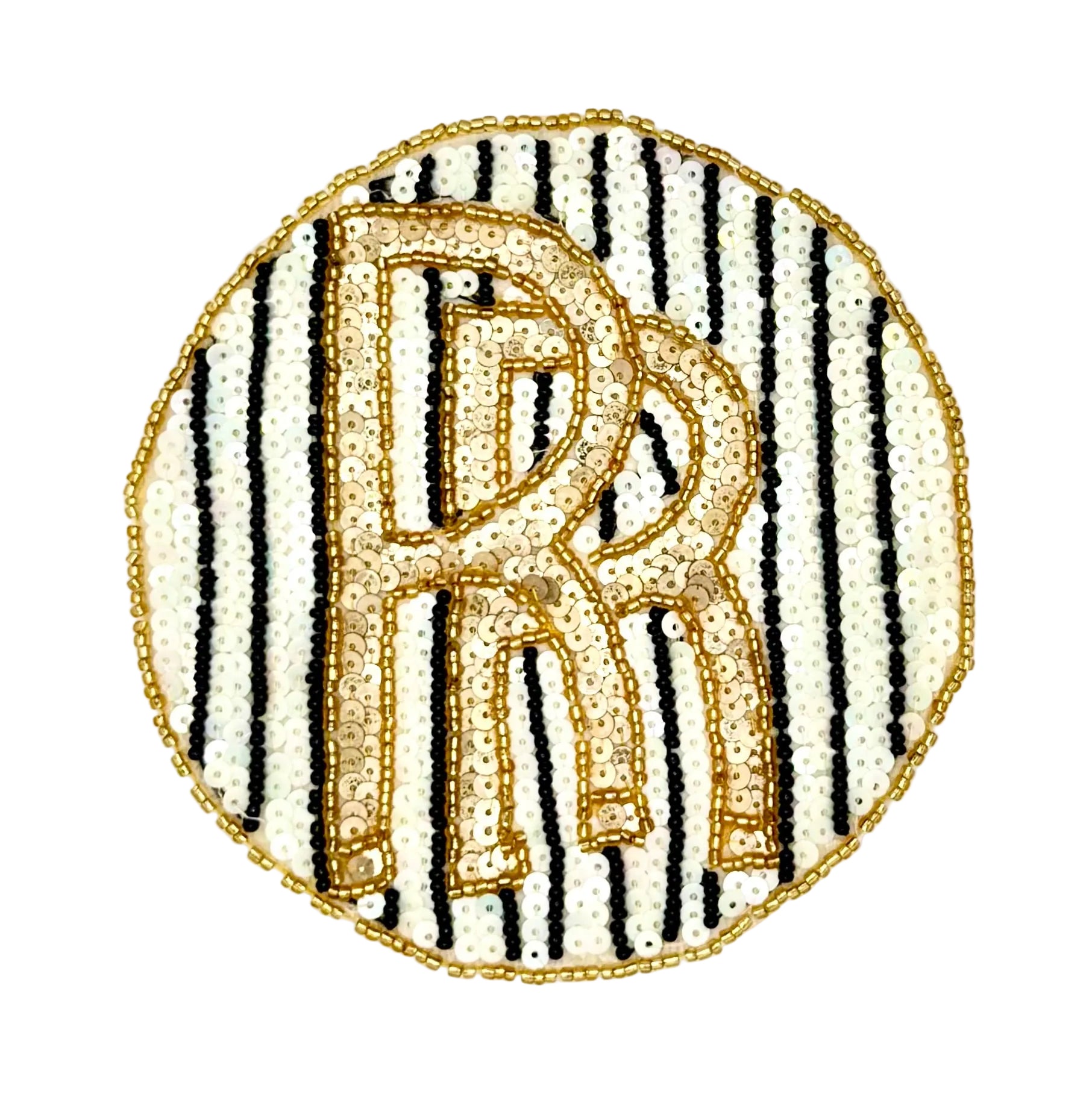 A circular sequin and bead vintage patch featuring a large interlocking gold monogram over vertical black and white stripes, finished with a gold border on a white background.